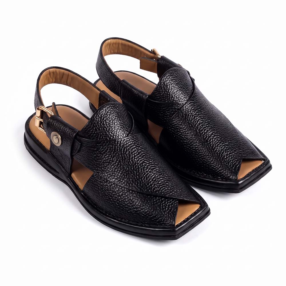 Black leather sandal showing the front design and buckle strap