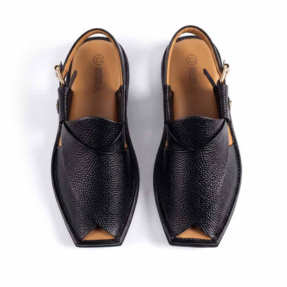 Close-up of black leather sandal for men showing its buckle and leather details