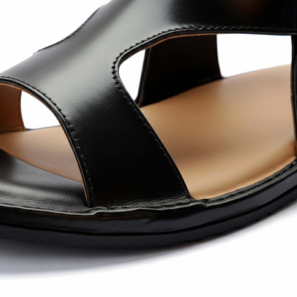 Black Panjedar chappals for men showing a close-up of the traditional leather design