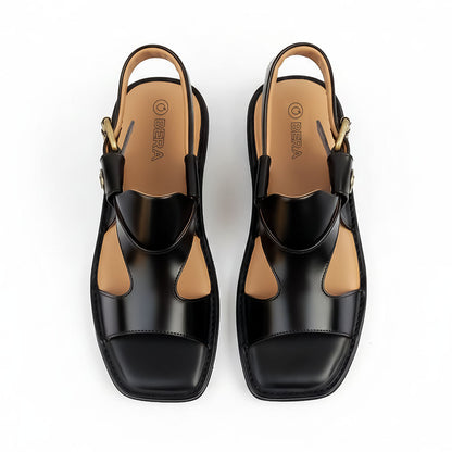 Black Panjedar chappals for men showing the front view and traditional leather design