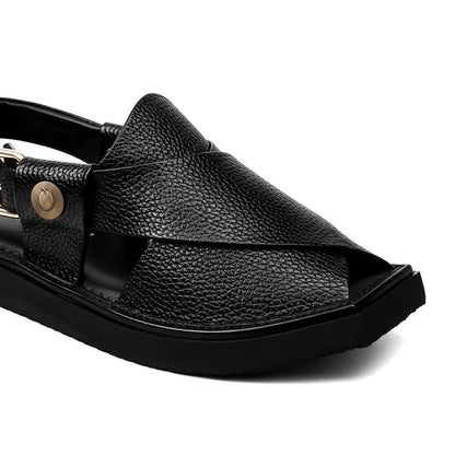 close-up of black Dot Khan Chappal showing textured leather straps, side buckle and black sole