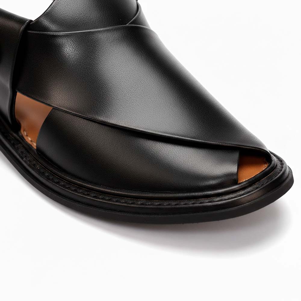 close-up of black Round Shape Peshawari Chappal showing smooth leather upper, open toe detail and stitched sole
