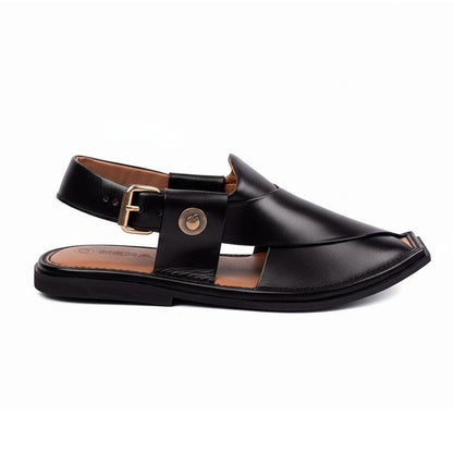 black Peshawari Kheri shown from the side with a wide leather upper, buckle strap and pointed toe