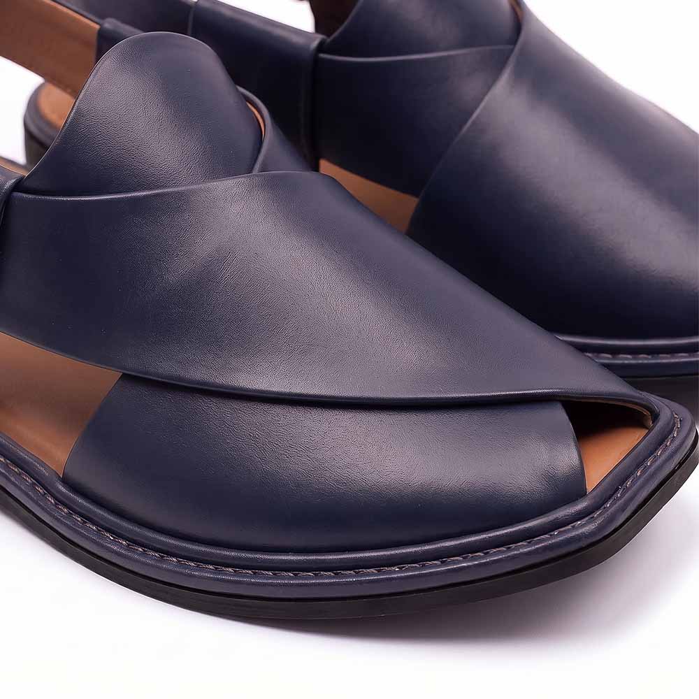 close-up of dark blue Charsadda Chappal showing overlapping leather straps and stitched sol