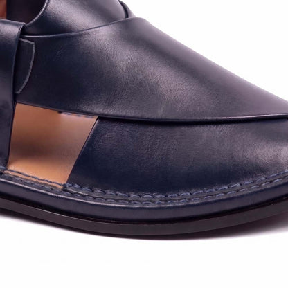 close-up of dark blue Peshawari Kheri showing the smooth leather upper, layered design and detailed stitching