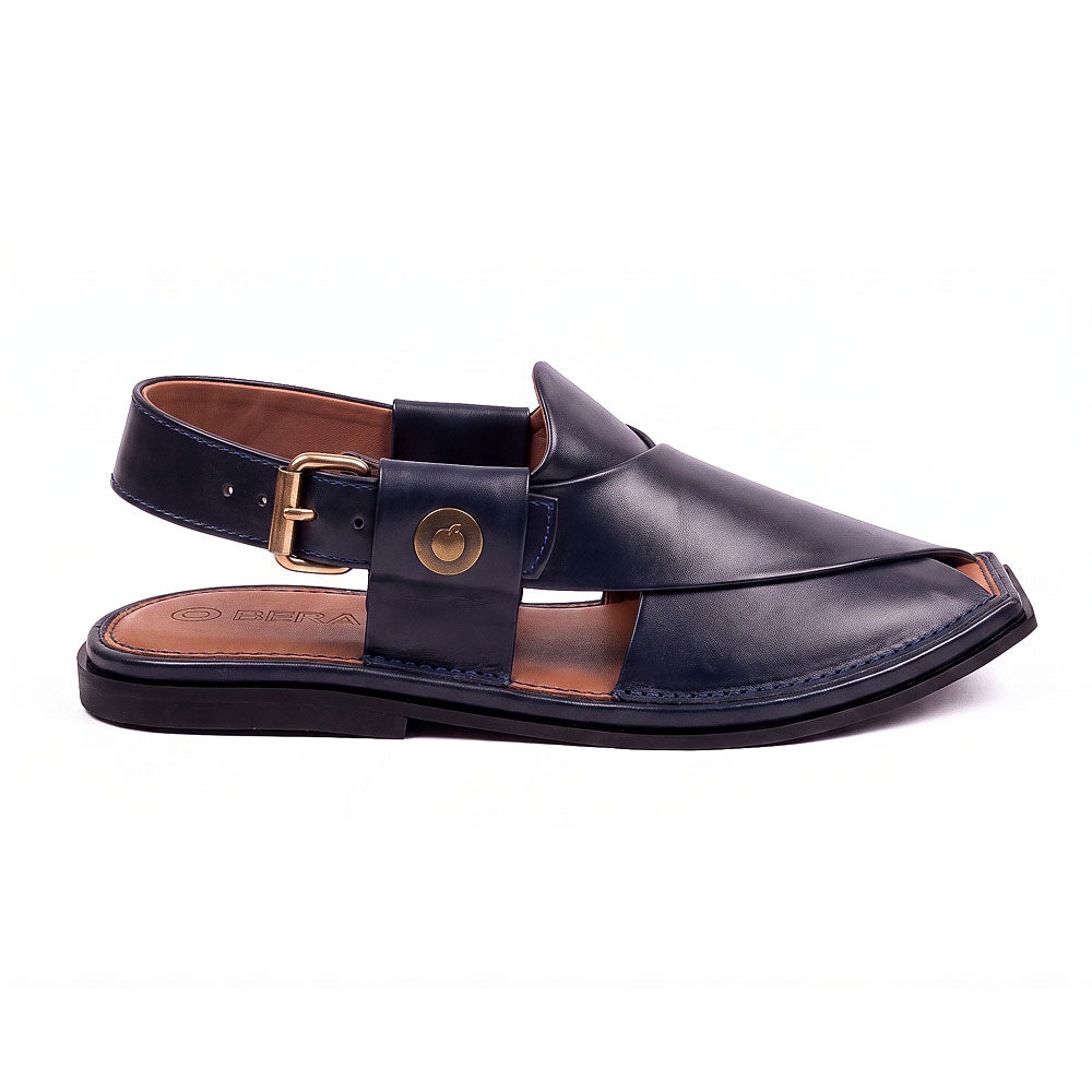  blue Peshawari Kheri shown from the side with layered leather upper and adjustable buckle strap