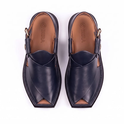 dark blue Peshawari Kheri pair shown from the top with crossed leather straps and branded insoles