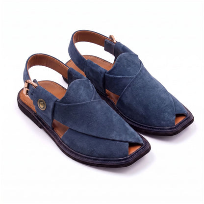 deep blue suede Peshawari Chappal pair shown from a three-quarter front view with crossed straps and adjustable heel buckles