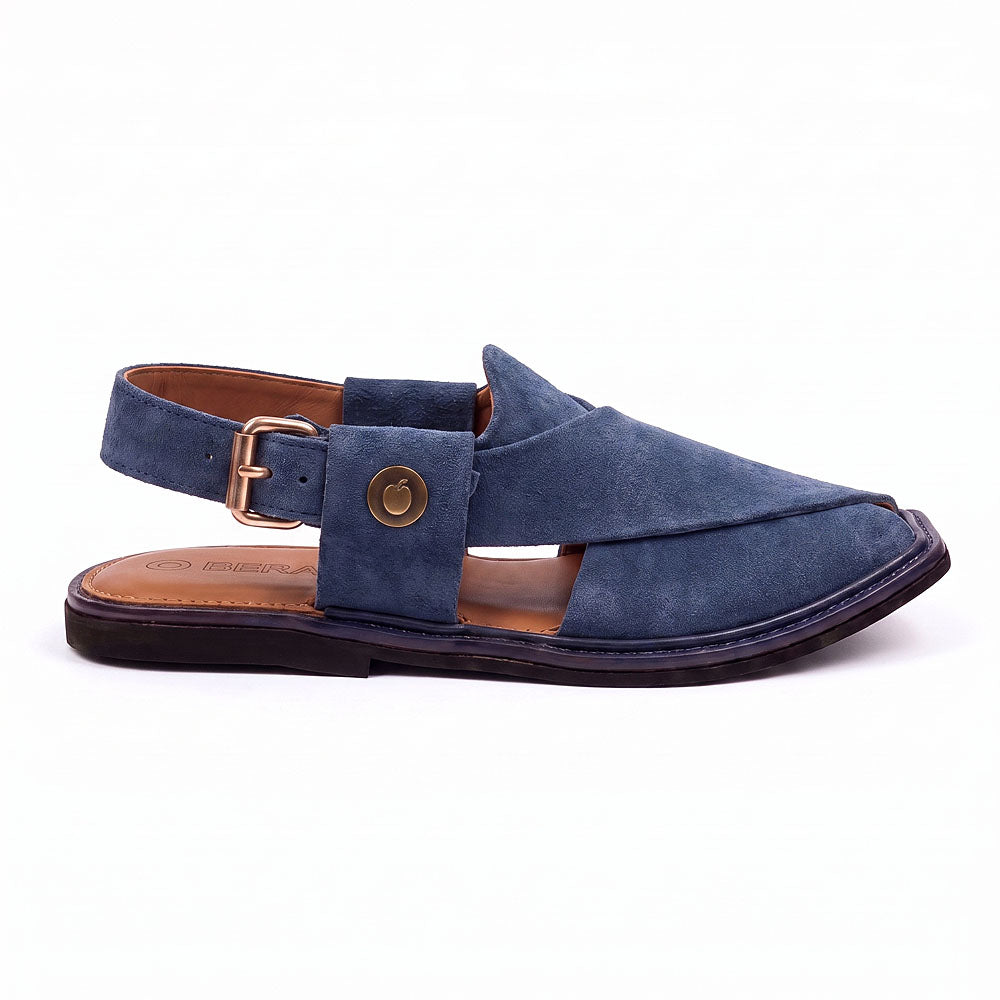 blue suede Peshawari Chappal shown from the side with crossed straps, side buckle and layered leather sole