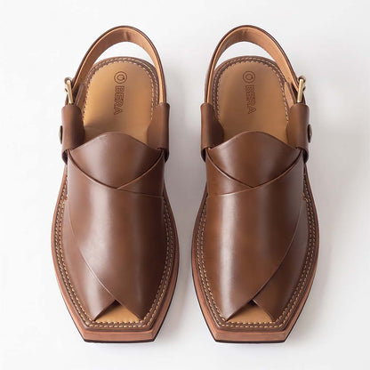 brown Kaptaan Chappal pair shown from above with wide overlapping leather straps and open pointed toes