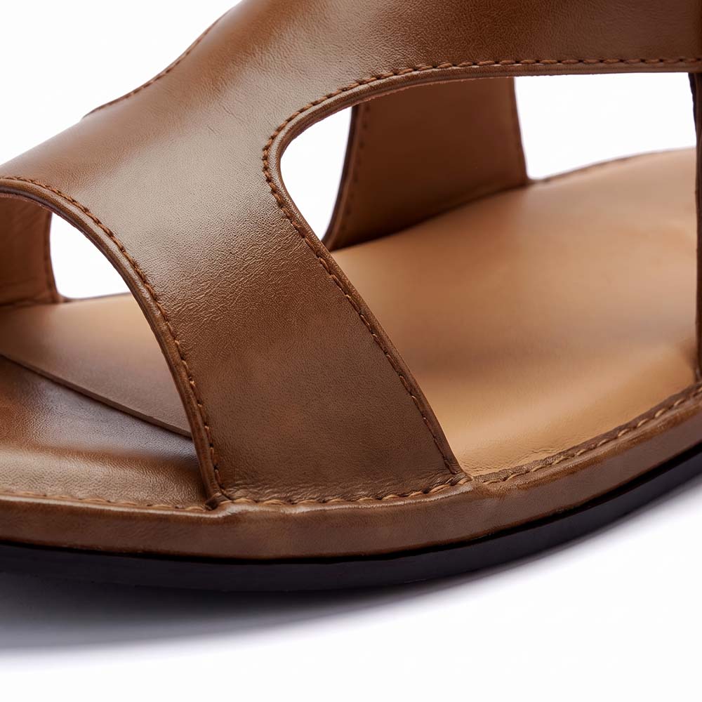 close-up of brown Kohati Penjedar Chappal showing smooth leather straps, detailed stitching and layered sole