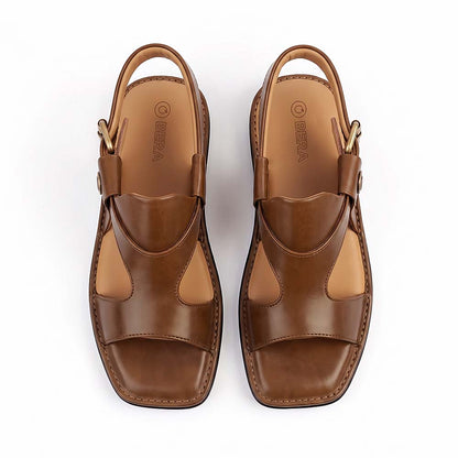 brown Kohati Penjedar Chappal shown from the side with a wide leather front strap and adjustable ankle buckle