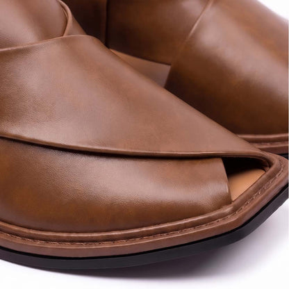 close-up of brown traditional Peshawari Chappal showing smooth leather panels, layered upper and detailed sole stitching