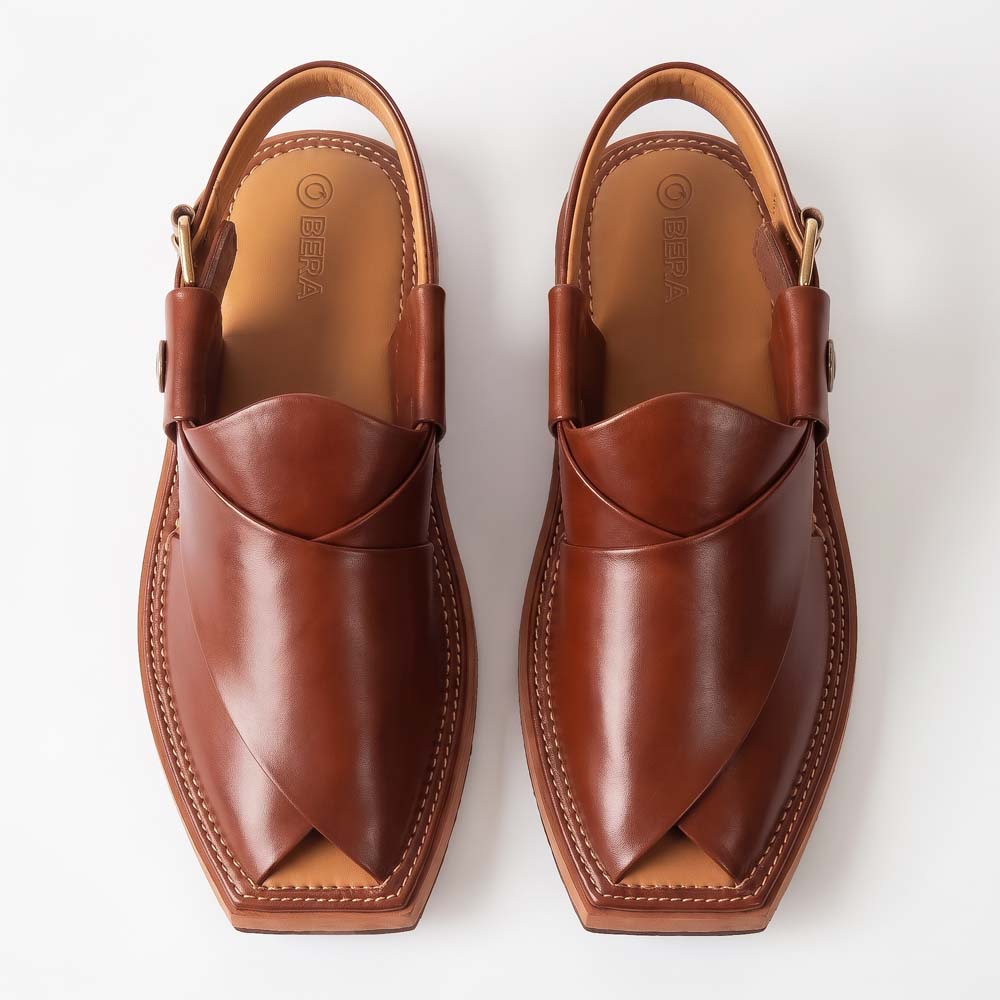 burgundy Kaptaan Chappal pair shown from the top with layered leather straps and tan branded insoles