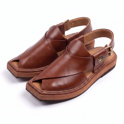 burgundy Khan Chappal pair shown from a three-quarter front view with overlapping leather upper and buckle straps