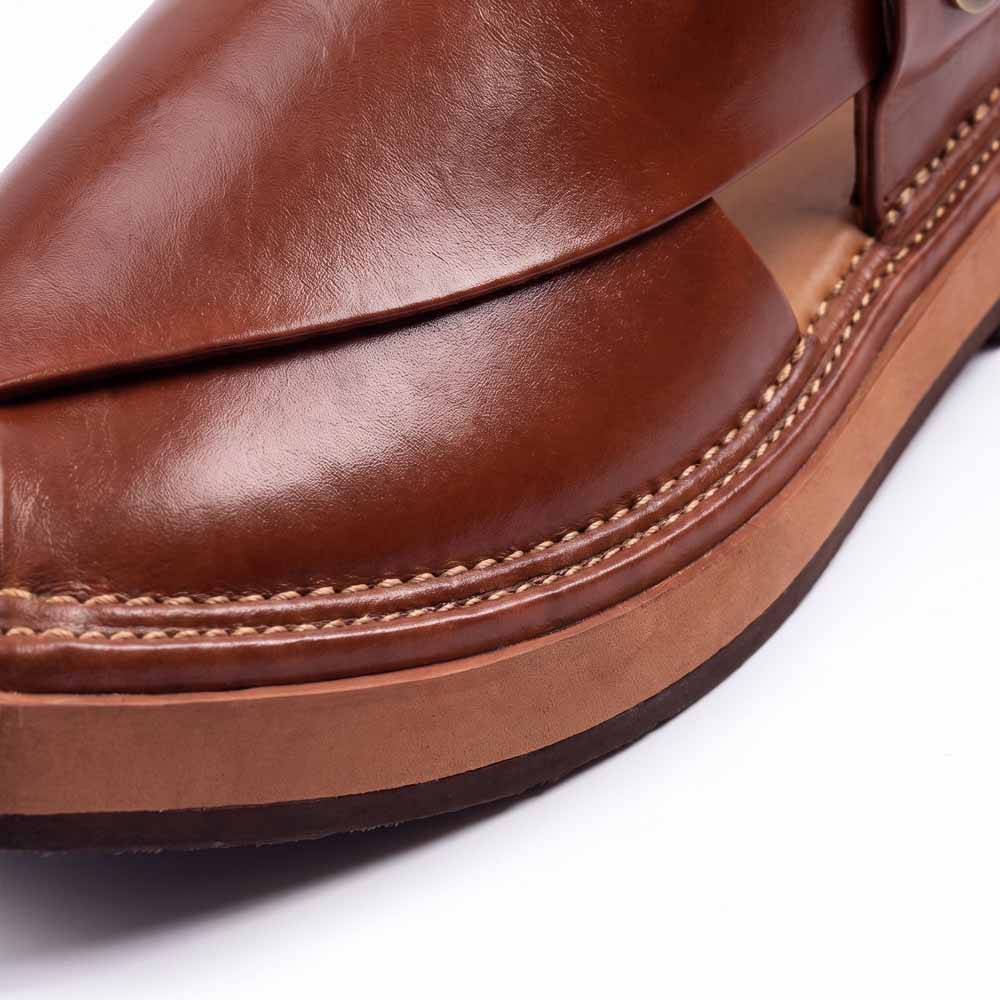 close-up of burgundy Kaptaan Chappal showing smooth leather, layered sole and detailed edge stitching