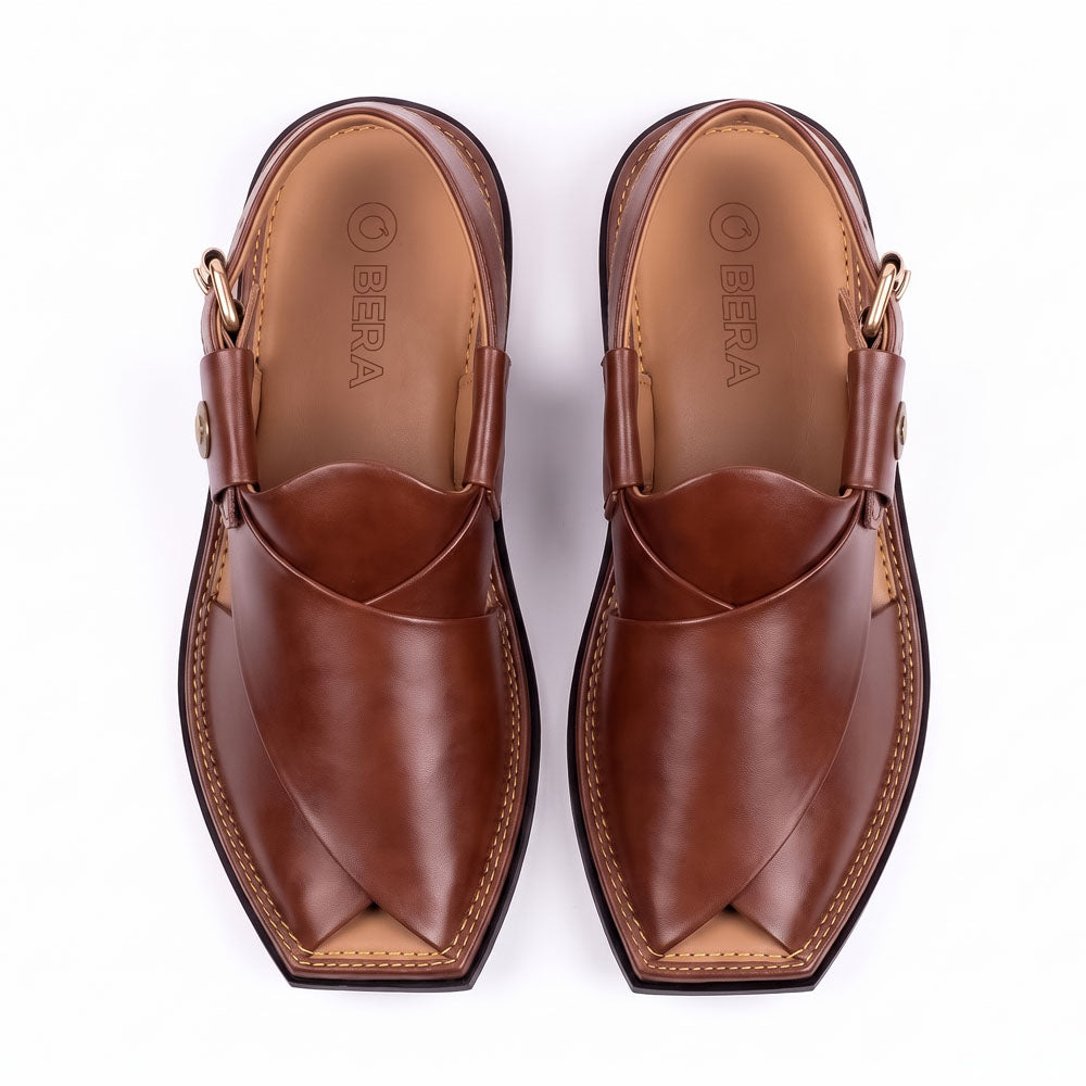 burgundy T-shape Peshawari Kheri pair shown from above with overlapping leather straps and branded insoles
