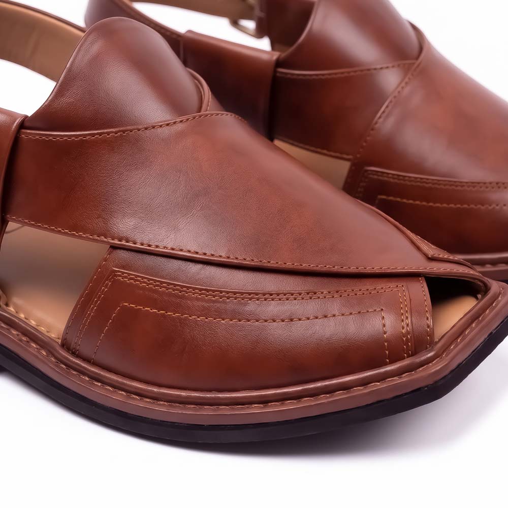 close-up of burgundy Taki Chappal showing smooth leather panels, layered upper and detailed stitching