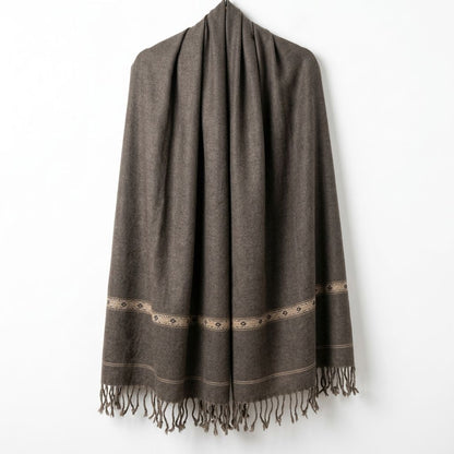 Men's dark charcoal brown wool shawl featuring a subtle beige woven border motif hanging smoothly on a display wall