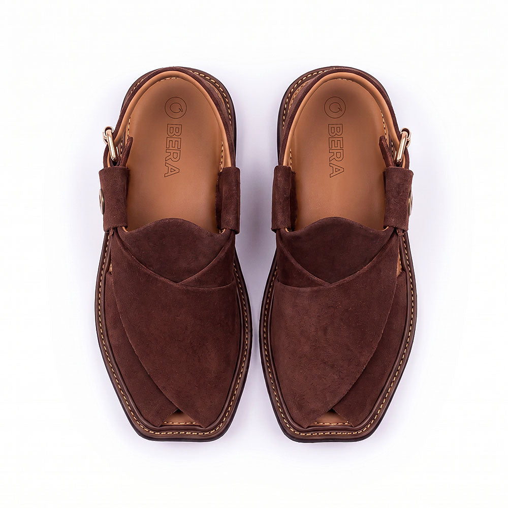 brown suede Peshawari Chappal pair shown from above with layered suede straps and branded insoles