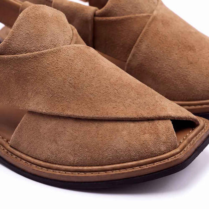 close-up of camel suede Peshawari Chappal showing textured leather layers and detailed stitching around the sole